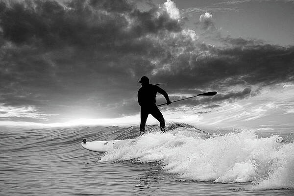 Surfer dude standing on board by Dan Friend Surfer dude standing on board by Dan Friend