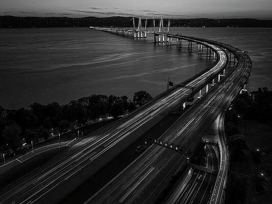 Wall Art featuring the photograph Tappan Zee Bridge Lit For Purple Heart Day BW by Susan Candelario