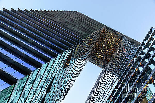 Wall Art - Photograph - The Collins Arch in Collins Street, and urban architectural development that bridged two existing skyscrapers with a linked skywalk. by Jane Rix