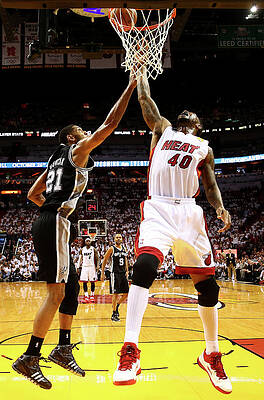 Wall Art - Photograph - Tim Duncan and Udonis Haslem by Andy Lyons