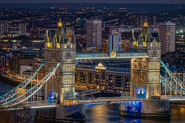 Tower bridge seen at night in London. by George Afostovremea Tower bridge seen at night in London. by George Afostovremea