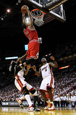 Wall Art - Photograph - Udonis Haslem, Derrick Rose, and Lebron James by Mike Ehrmann