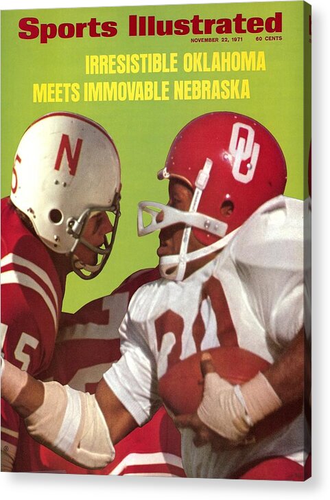 Magazine Cover Acrylic Print featuring the photograph Nebraska Bob Terrio And Oklahoma Greg Pruitt Sports Illustrated Cover by Sports Illustrated