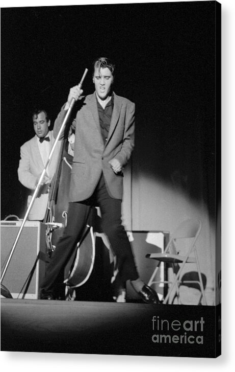 Elvis Presley Acrylic Print featuring the photograph Elvis Presley and Bill Black performing in 1956 by The Harrington Collection
