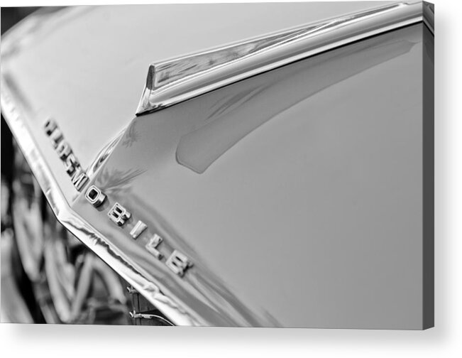 1962 Oldsmobile Hood Ornament And Emblem Acrylic Print featuring the photograph 1962 Oldsmobile Hood Ornament and Emblem by Jill Reger