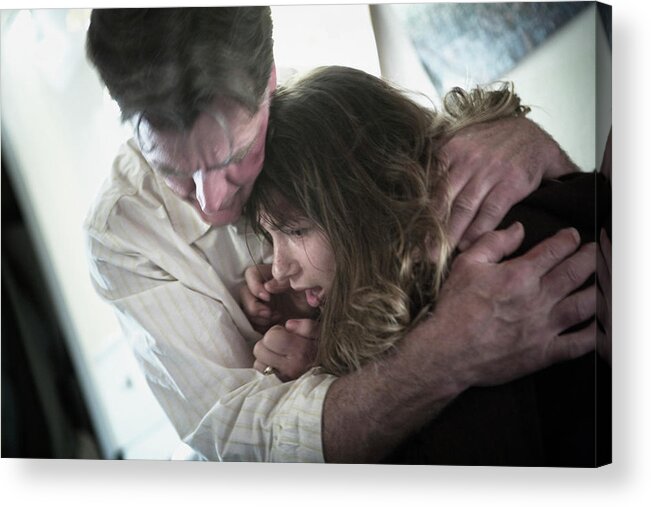 Color Acrylic Print featuring the photograph A Man Holding A Young Woman #1 by Ron Koeberer