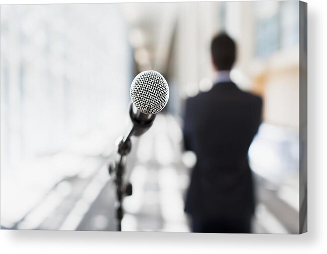 Young Men Acrylic Print featuring the photograph Close up of microphone in office #1 by Martin Barraud