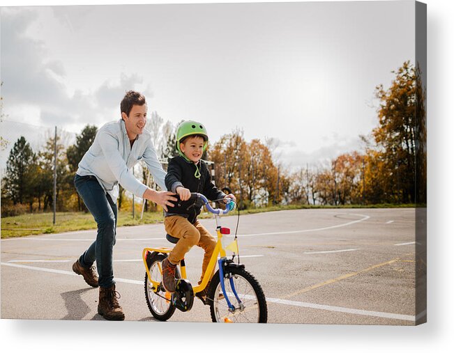 Young Men Acrylic Print featuring the photograph Learning to ride a bicycle #1 by AleksandarNakic
