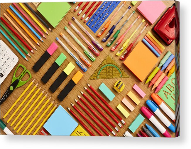 Education Acrylic Print featuring the photograph Office and school supplies arranged on wooden table - Knolling #1 by Neustockimages