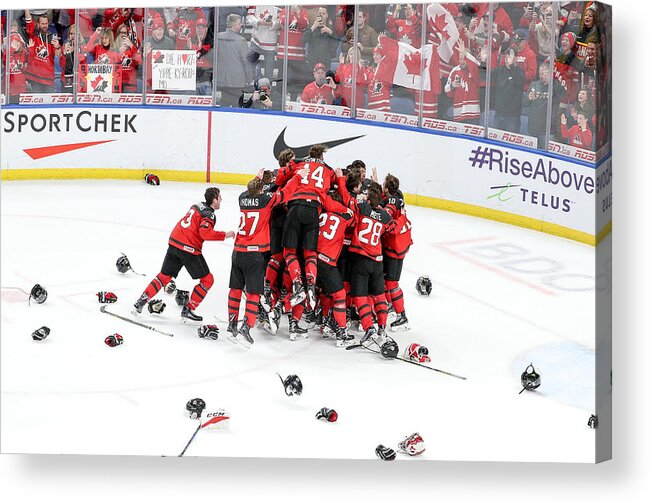 Following Acrylic Print featuring the photograph Sweden v Canada: Gold Medal Game - 2018 IIHF World Junior Championship #2 by Nicholas T. LoVerde