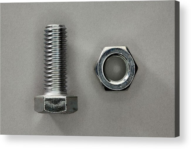 Two Objects Acrylic Print featuring the photograph A Bolt And A Nut by Larry Washburn
