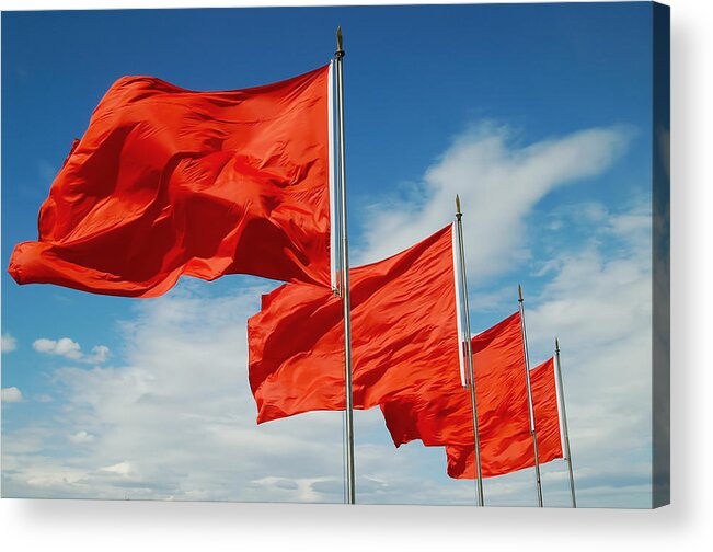 Chinese Culture Acrylic Print featuring the photograph A row of red flags blowing in the wind by Mozcann