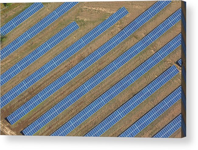 Environmental Conservation Acrylic Print featuring the photograph Aerial View Of Solar Panels In Field by Allan Baxter