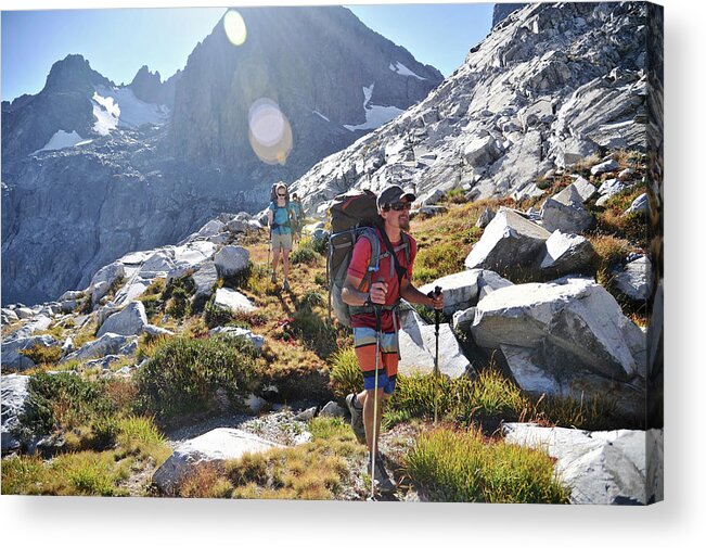 Lens Flare Acrylic Print featuring the photograph Backpacker Hiking Minaret Mountains by HagePhoto