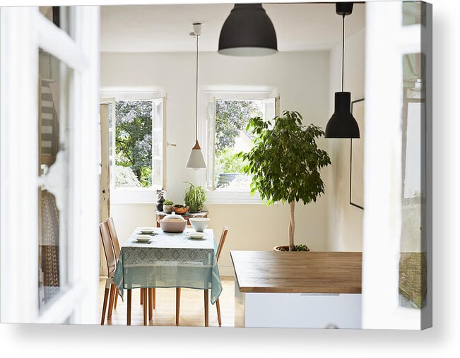 Wind Acrylic Print featuring the photograph Bright modern kitchen and dining room in an old country house by Westend61