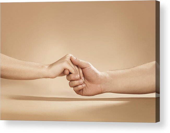 Young Men Acrylic Print featuring the photograph Close Up Of Man And Woman Holding Hands In Studio by Paper Boat Creative