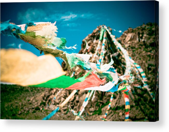 Mountain Acrylic Print featuring the photograph Colourfull praying buddhist flags lungta and mountain at background by Raimond Klavins