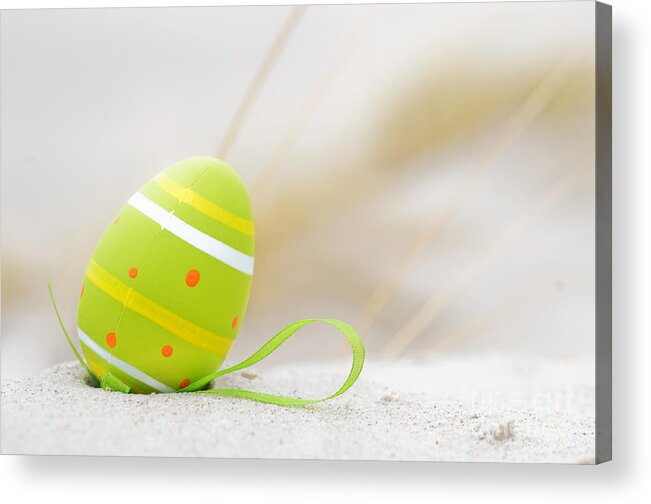 Easter Acrylic Print featuring the photograph Easter decorated egg on sand by Michal Bednarek