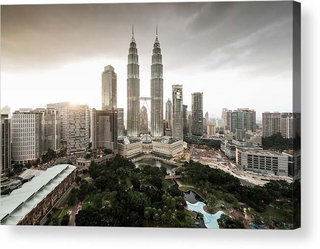 Built Structure Acrylic Print featuring the photograph Elevated View Of The Petronas Towers At by Martin Puddy