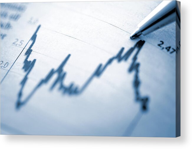 Financial Figures Acrylic Print featuring the photograph Finance chart with high peak on document by Deepblue4you