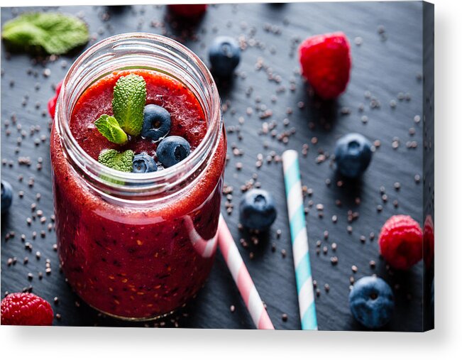 Black Color Acrylic Print featuring the photograph Fresh healthy blueberries raspberries and chia seeds smoothie by Foment