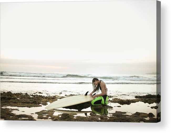 Three Quarter Length Acrylic Print featuring the photograph Girl Preparing Surfing Board On Rocky by Stanislaw Pytel