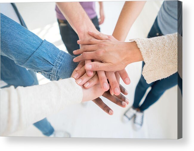 Working Acrylic Print featuring the photograph Group of people working at a team by Andresr