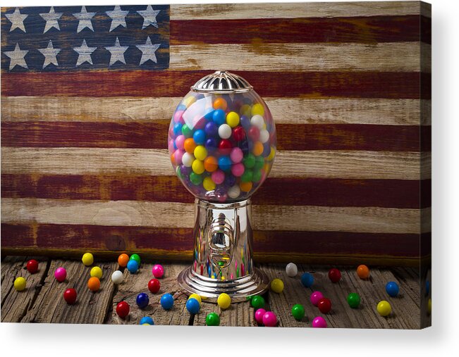 Bubblegum Machine American Acrylic Print featuring the photograph Gumball machine and old wooden flag by Garry Gay