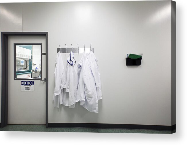 Medical Research Acrylic Print featuring the photograph Lab coats on hanger by Cavan Images
