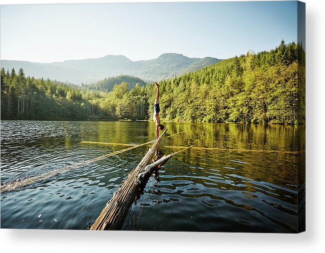Scenics Acrylic Print featuring the photograph Man Doing Handstand On Log In Alpine by Thomas Barwick