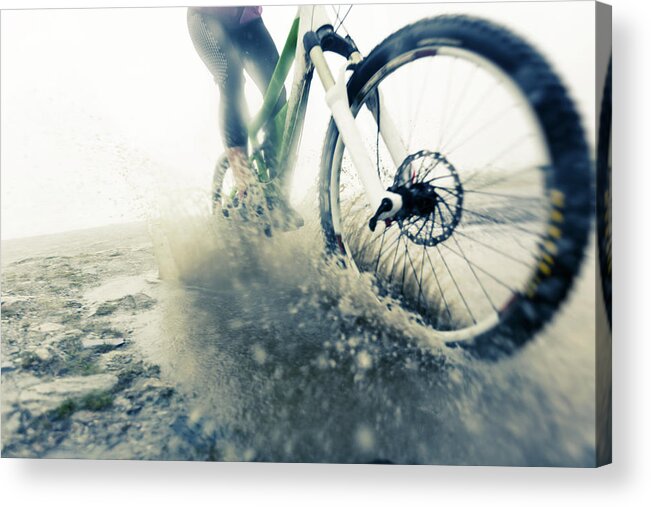 People Acrylic Print featuring the photograph Mountain Biker Racing Through Puddle by Nullplus