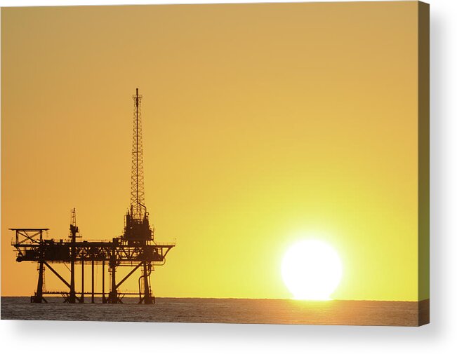 Oil Rig Acrylic Print featuring the photograph Offshore Oil Rig and Sun by Bradford Martin