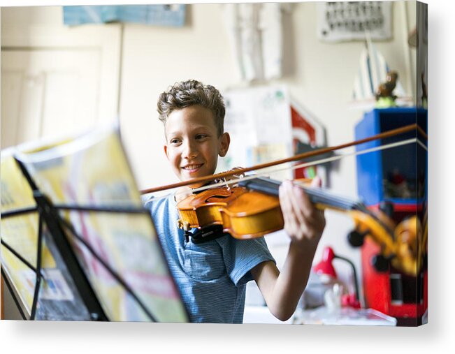 People Acrylic Print featuring the photograph Smiling boy playing violin in domestic room by Portra