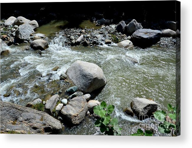Blue Acrylic Print featuring the photograph Stream water foams and rushes past boulders by Imran Ahmed