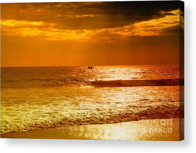 Sunset Acrylic Print featuring the photograph sunset in gold and red at the Hikkaduwa beach by Gina Koch