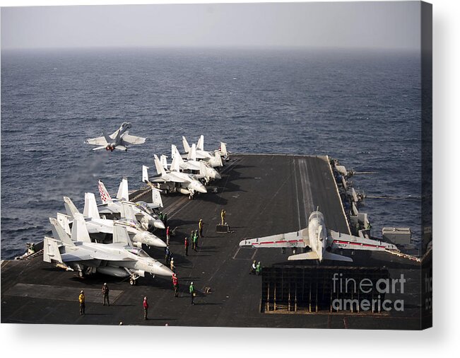 Military Acrylic Print featuring the photograph Uss Enterprise Conducts Flight by Stocktrek Images