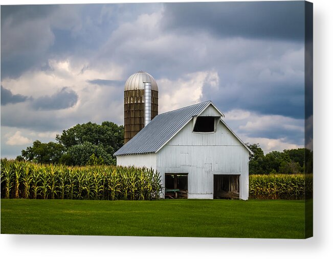 Art Acrylic Print featuring the photograph White Barn and Silo with Storm Clouds by Ron Pate