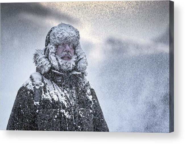 Cool Attitude Acrylic Print featuring the photograph Wintery scene of a man with Furry and full beard shivering in a snow storm by DieterMeyrl
