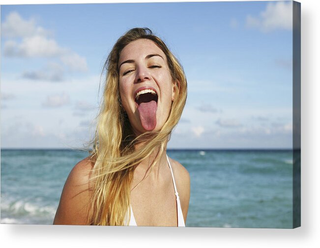 Caucasian Ethnicity Acrylic Print featuring the photograph Woman Sticking Out Tongue by Dimitri Otis