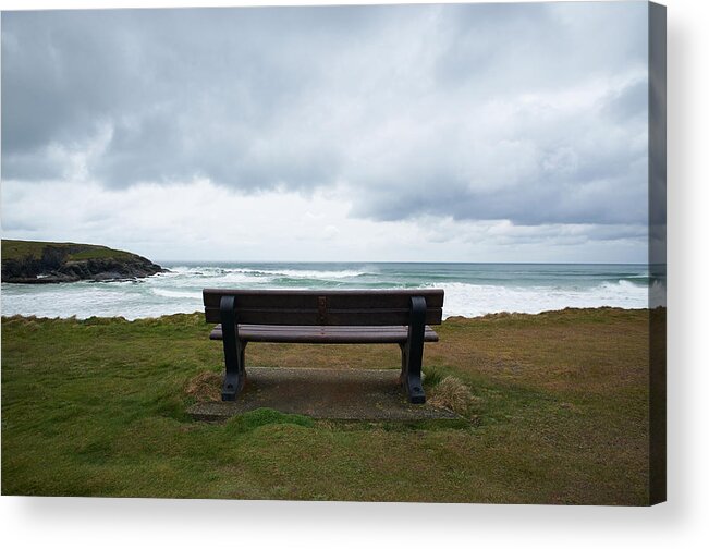 Grass Acrylic Print featuring the photograph Wooden Bench Facing Sea On Uk Coastline by Dougal Waters