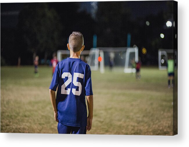 Soccer Uniform Acrylic Print featuring the photograph Young Soccer Player by SolStock