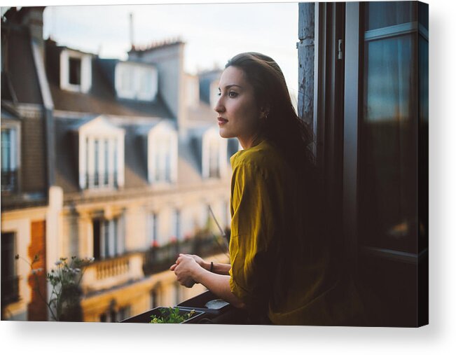 Cool Attitude Acrylic Print featuring the photograph Young woman relaxing on the balcony of her Montmartre apartment by Lechatnoir