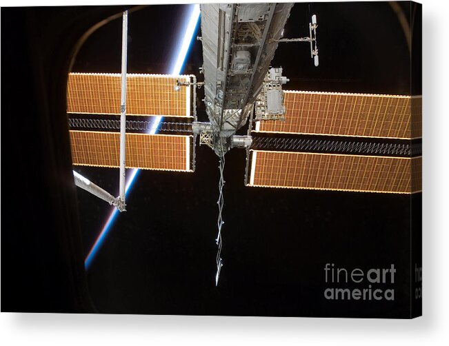 Nasa Acrylic Print featuring the photograph Iss Solar Array #1 by Nasa