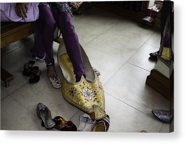 Amritsar Acrylic Print featuring the photograph Trying on a very large decorated shoe by Ashish Agarwal