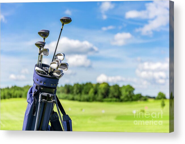 Golf Acrylic Print featuring the photograph Golf equipment bag standing on a course. #1 by Michal Bednarek