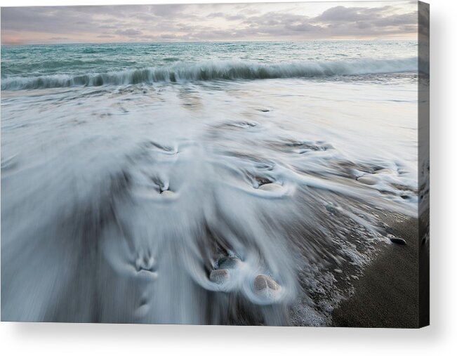 Coastline Acrylic Print featuring the photograph Pebbles in the beach and flowing sea water by Michalakis Ppalis