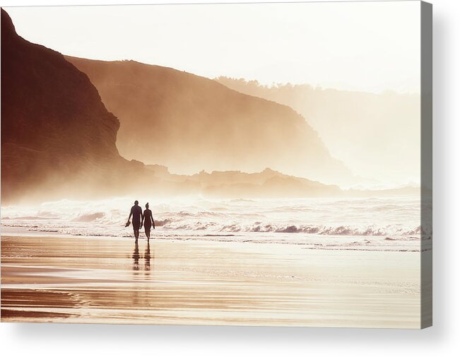 Couple Acrylic Print featuring the photograph Couple Walking On Beach With Fog by Mikel Martinez de Osaba