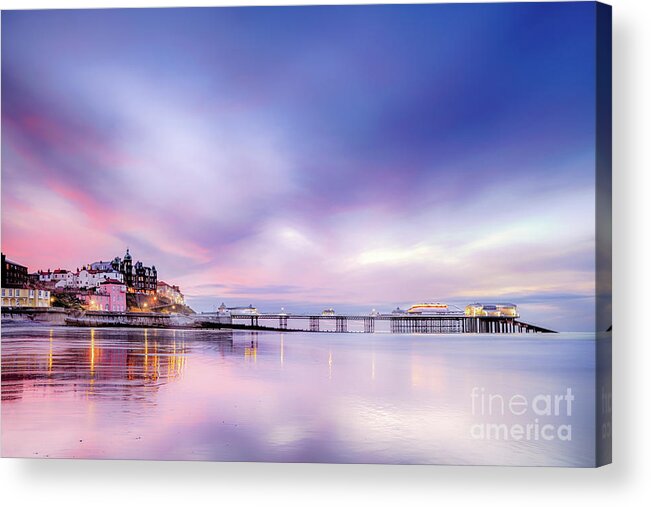 Cromer Acrylic Print featuring the photograph Famous Cromer pier in Norfolk England with pink sunset by Simon Bratt