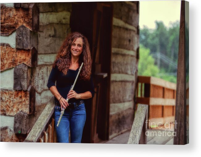 Nina Assimakopoulos Acrylic Print featuring the photograph Female flute player at log cabin by Dan Friend
