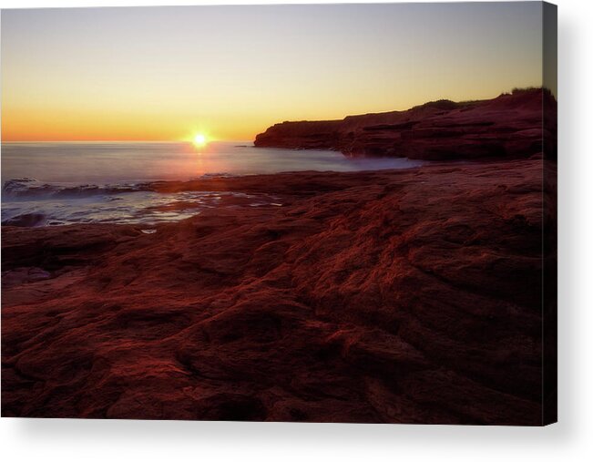 Bluffs By The Ocean Acrylic Print featuring the photograph First light on Red Sandstone beach by Chris Bordeleau
